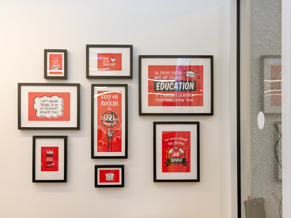 Framed posters on the Redgate campus' walls