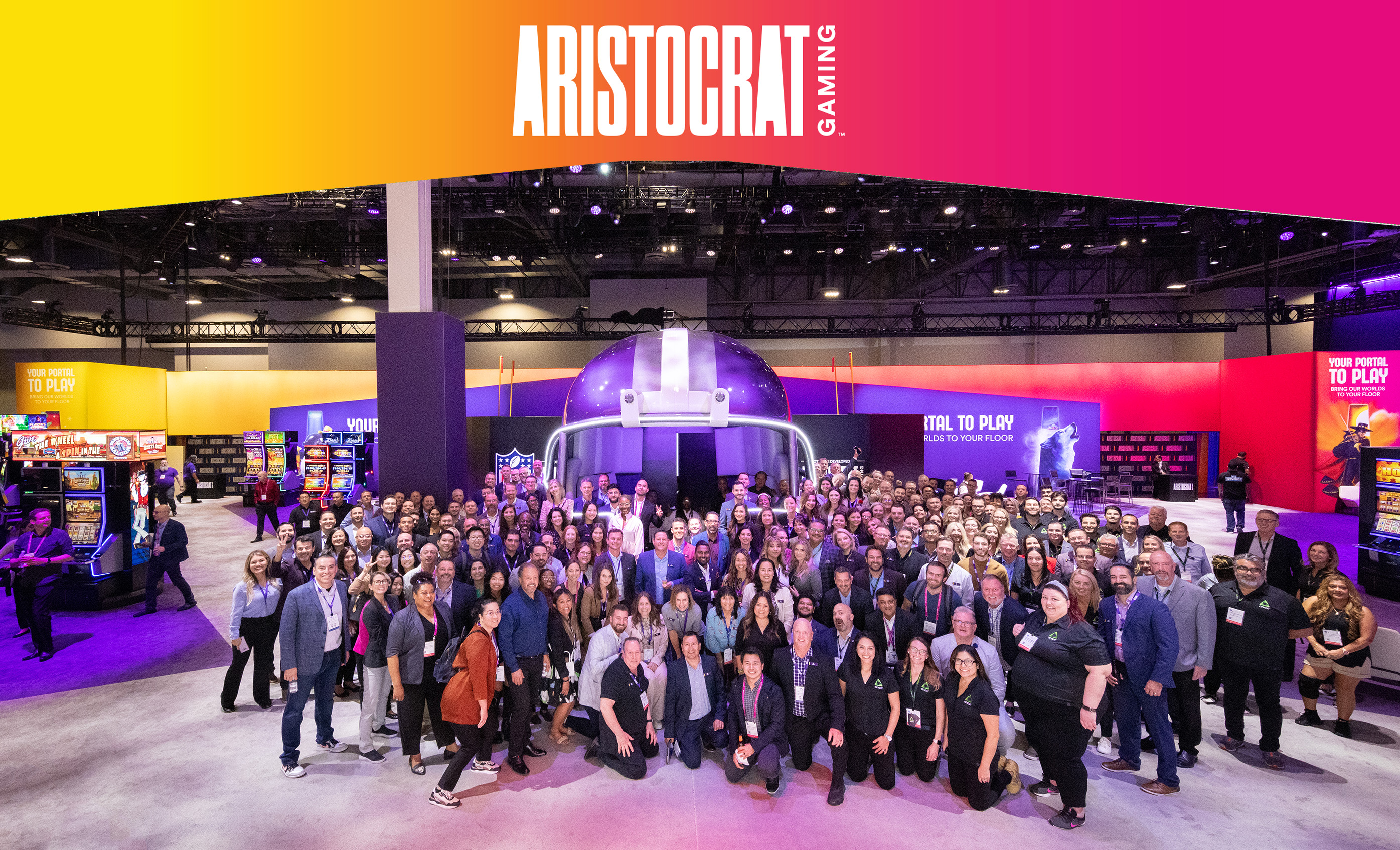 Large group photo of Aristocrat team at a conference