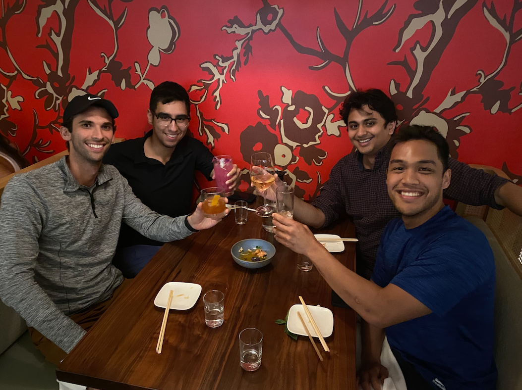 Method Financial team members at a restaurant together