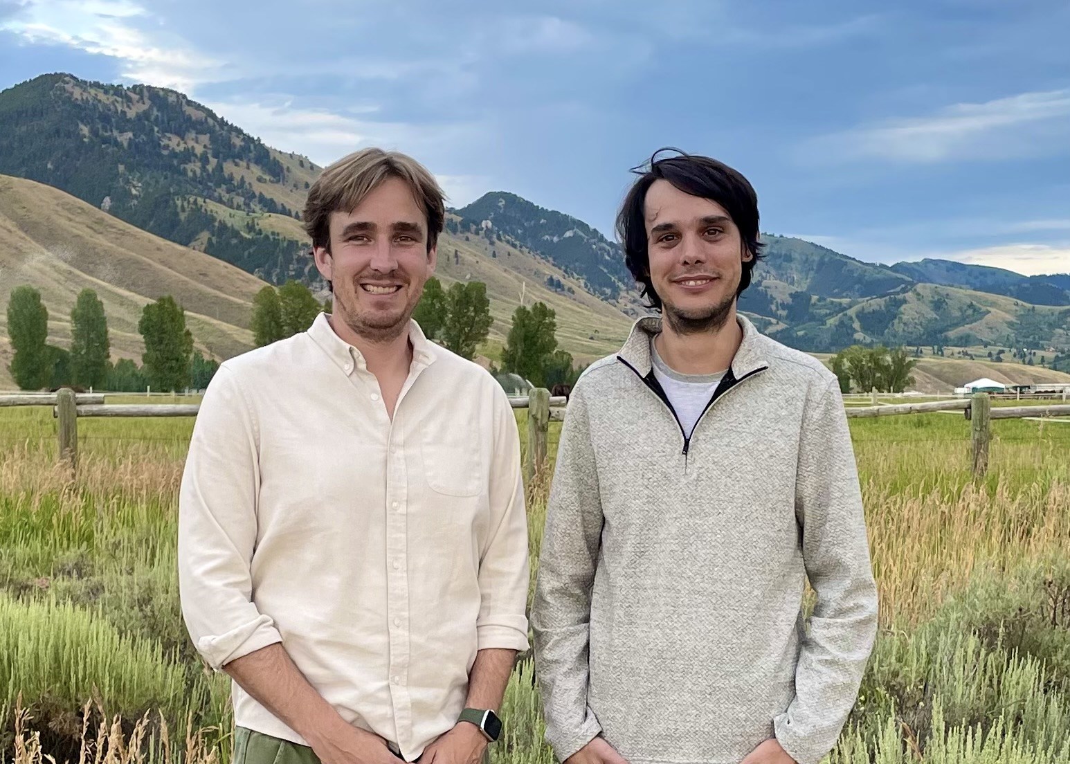 Nudge Security co-founders Russell Spitler and Jaime Blasco stand in front of a mountain range