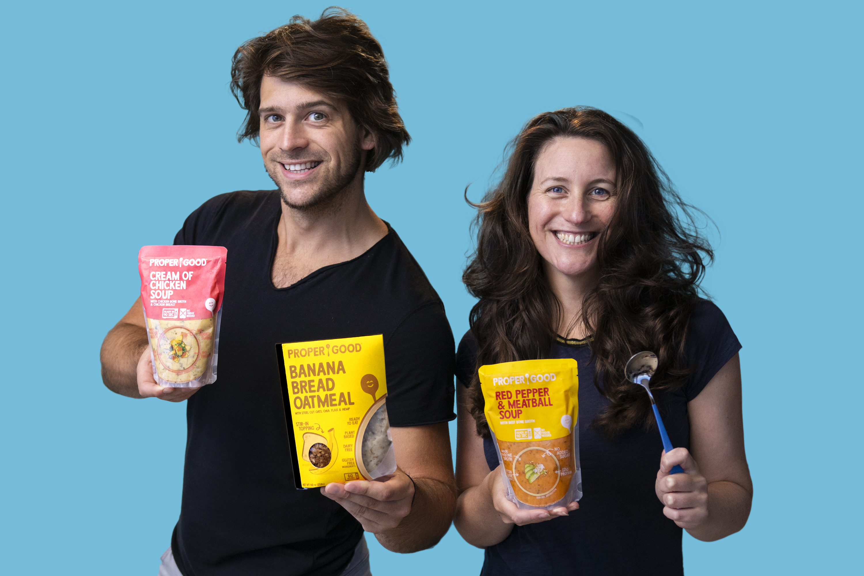 PROPER GOOD co-founders and siblings Christopher and Jennifer Jane hold products