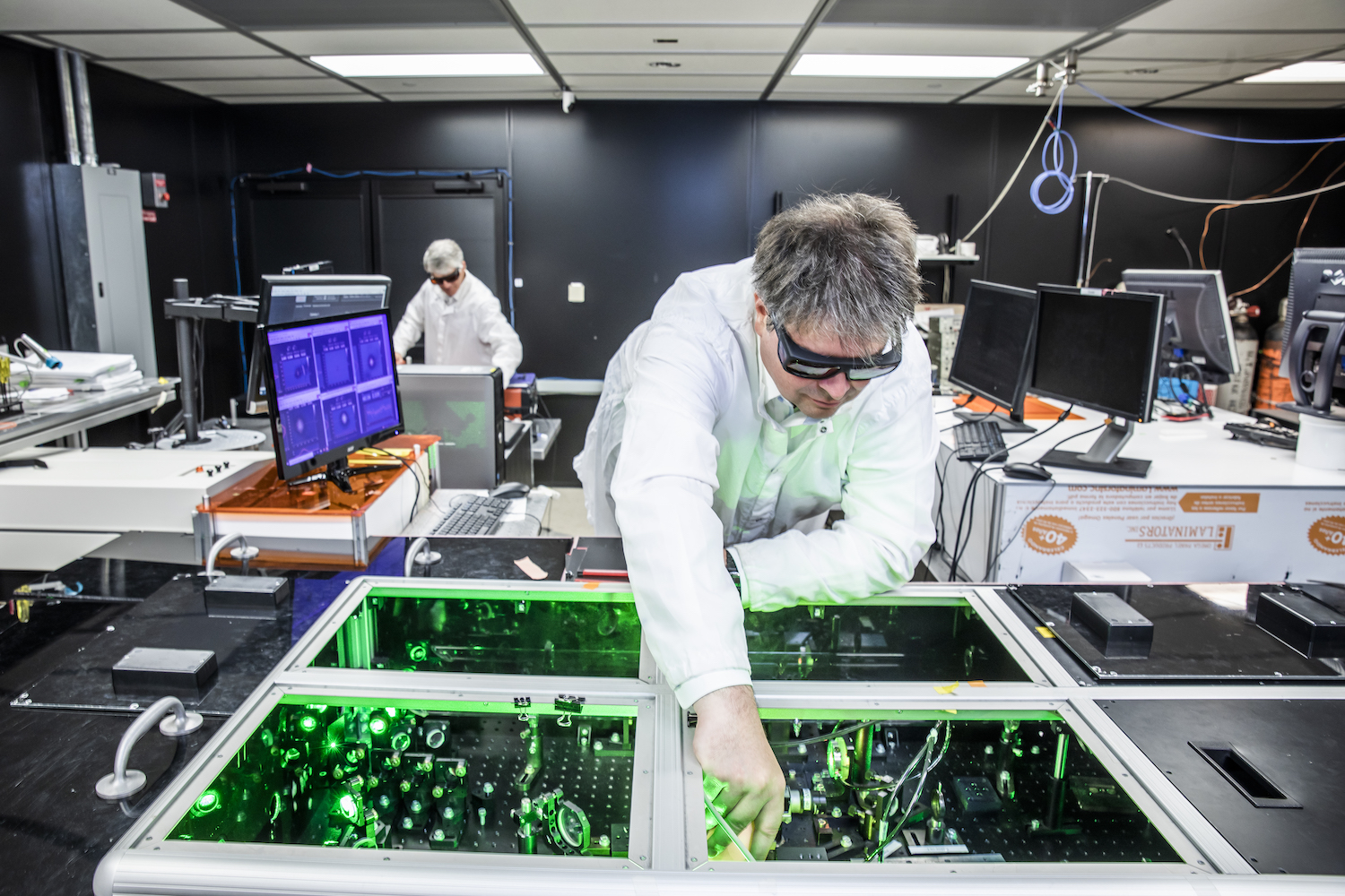 Bjorn Manuel Hegelich aligns laser beams at the University of Texas at Austin
