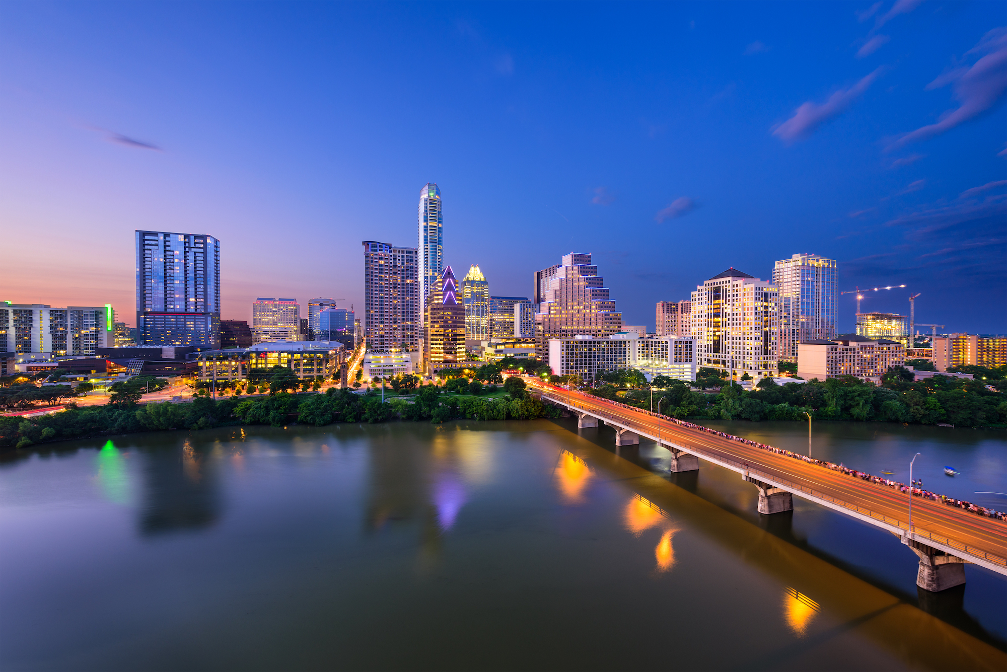 A nighttime photo of the Austin skyline.