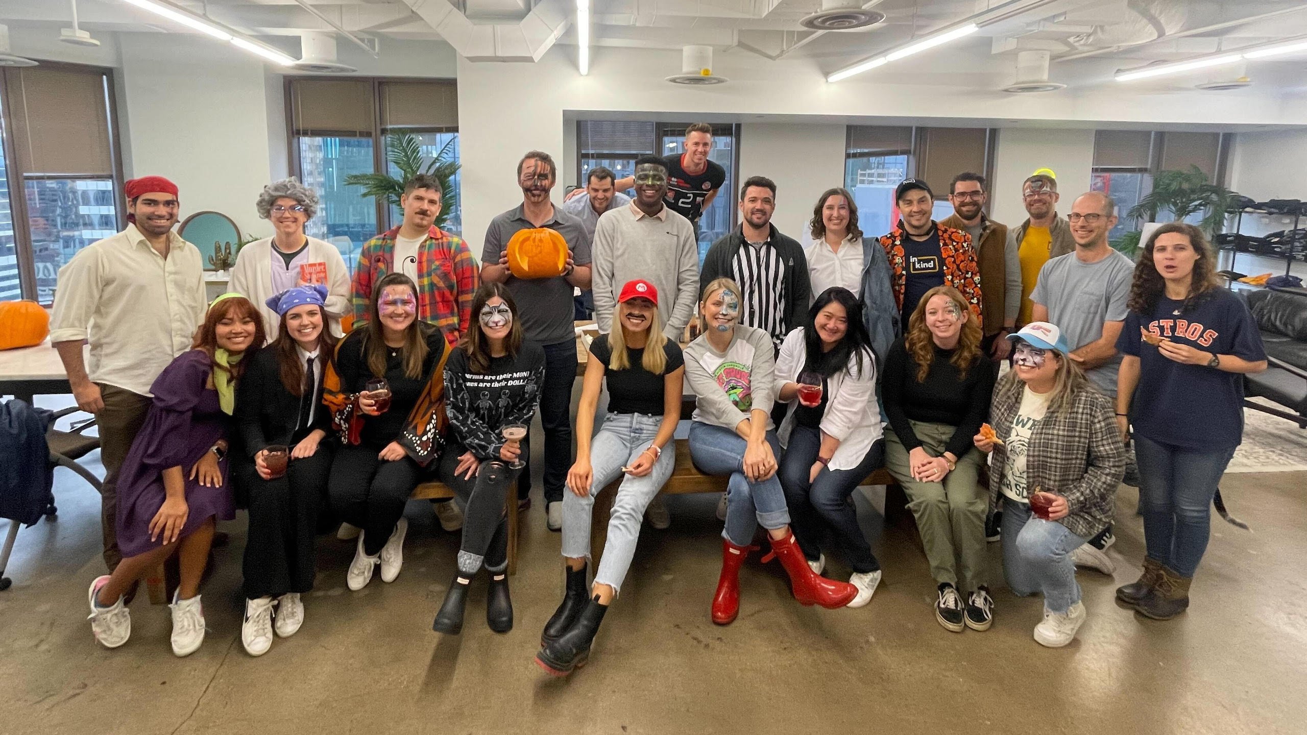 inKind team members dress up for a costume party. 