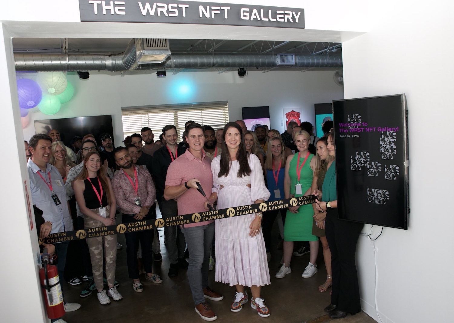 WRST Collabs co-founders Matt Wursta, left, and Deanna Wursta hold a ribbon-cutting event for The WRST NFT Gallery on June 11.