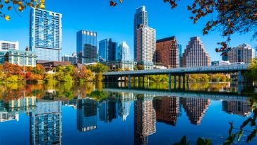 Downtown Austin, Texas skyline reflecting on Lady Bird Lake.