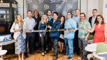 Macami co-founder andCEO Carlos Martin cuts the ribbon at a launch celebration featuring members of the Austin Chamber of Commerce and Austin Tech Council. | Photo: Macami.ai