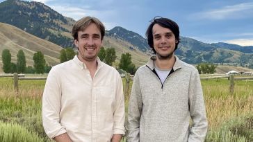 Nudge Security co-founders Russell Spitler and Jaime Blasco stand in front of a mountain range