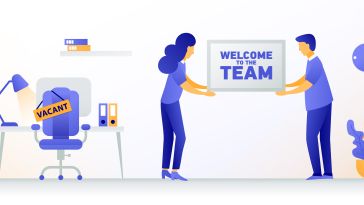 animated image of two people holding a "welcome to the team" sign in an office setting